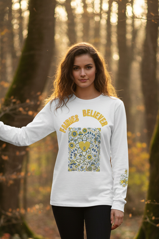 Woman wearing a white long-sleeve shirt with floral design and text in a forest setting