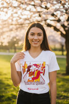 Woman wearing a white t-shirt with a graphic design in a park